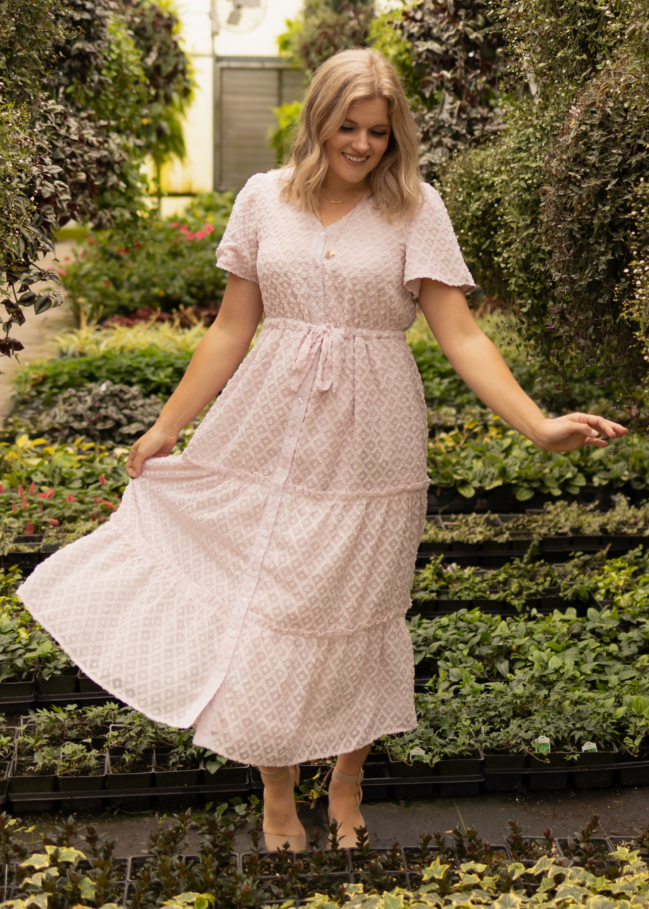 Front view of a short sleeve dusty pink dress