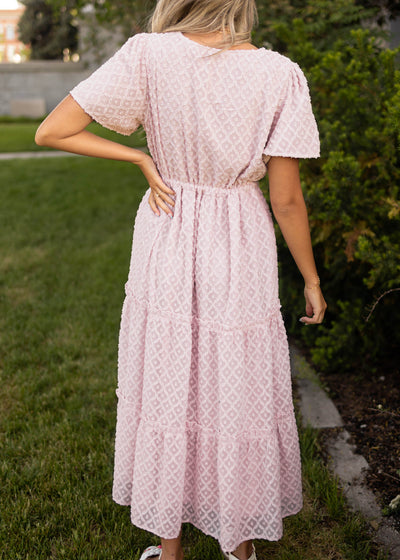 Back view of a short sleeve dusty pink dress