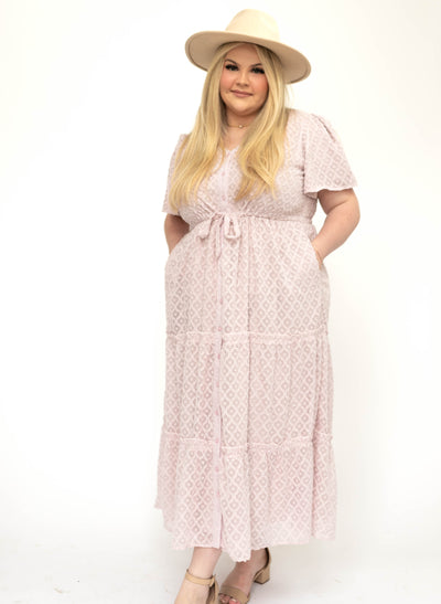 Plus size dusty pink dress with tiered skirt