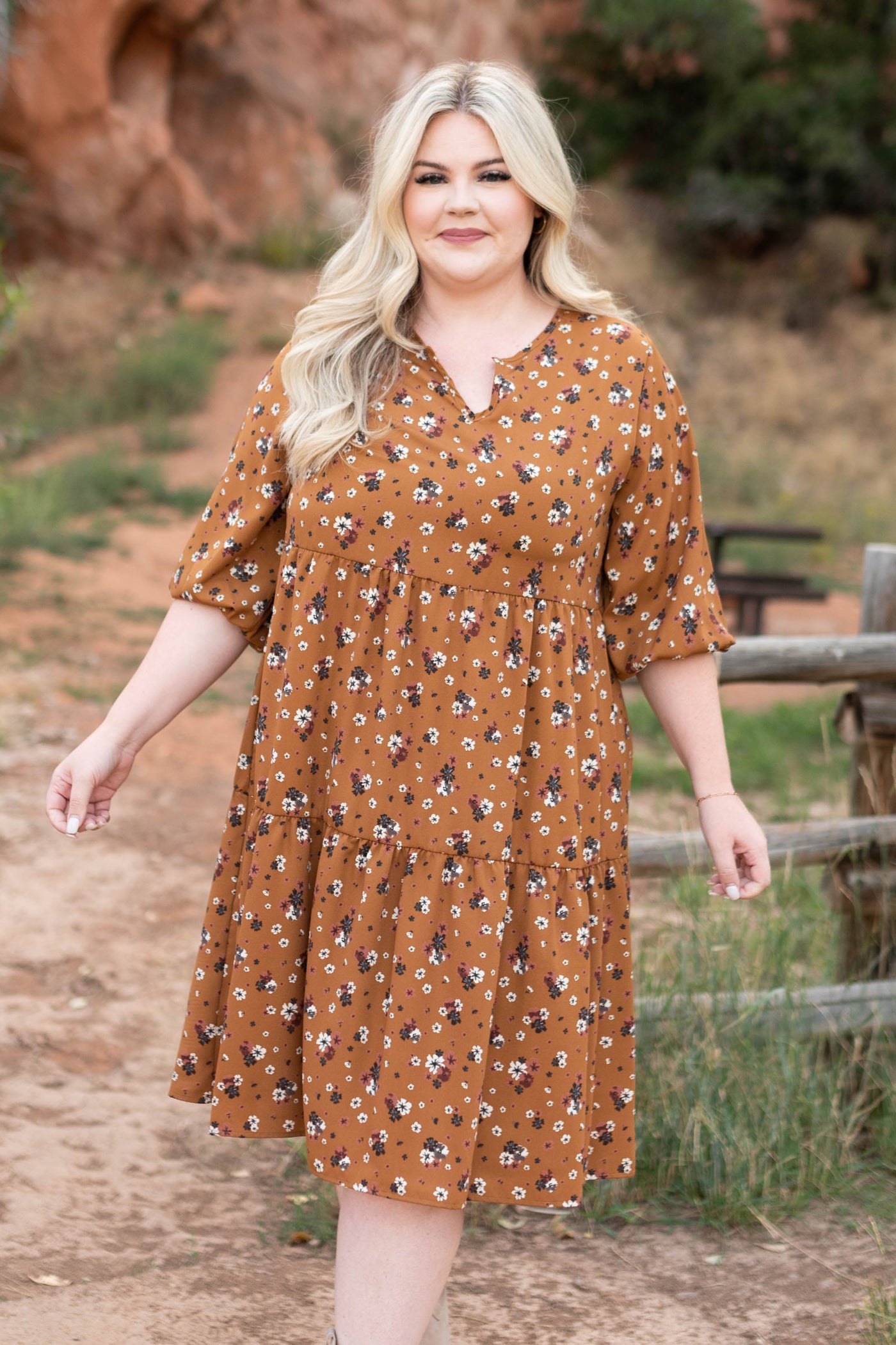 Plus size camel dress with a tiered skirt