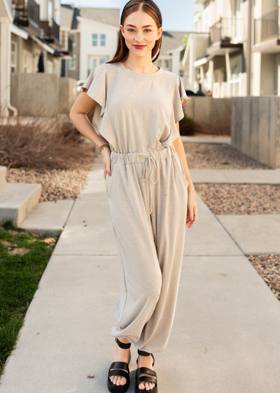Taupe drawstring jumpsuit with jogger style pants