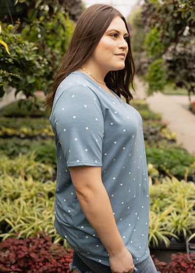 Side view of a plus size chambray top