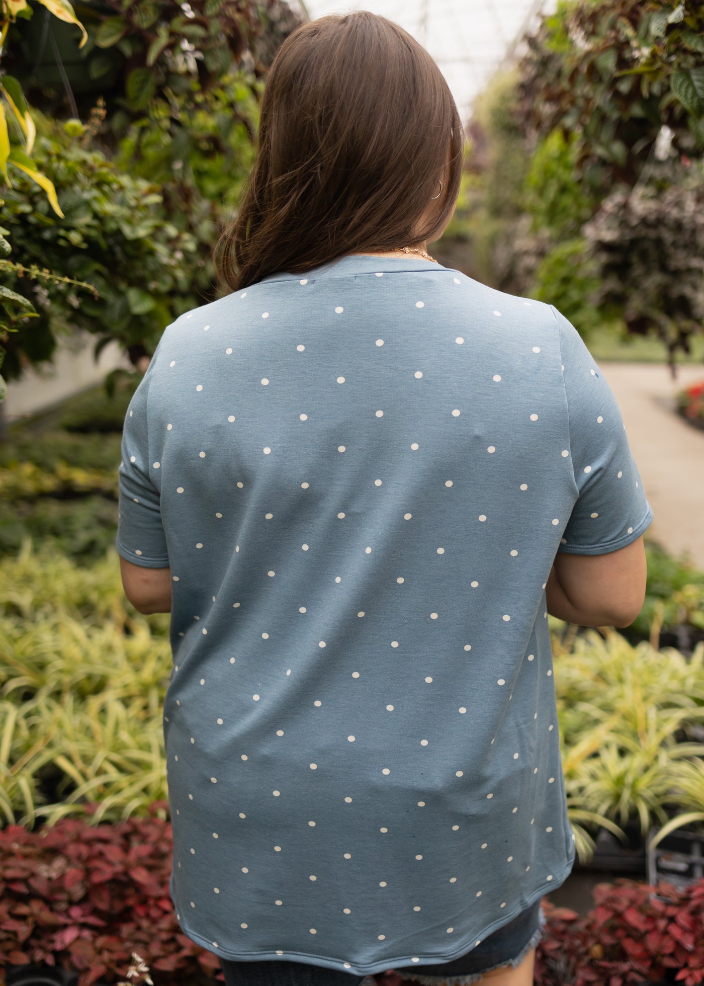 Back view of a plus size chambray top