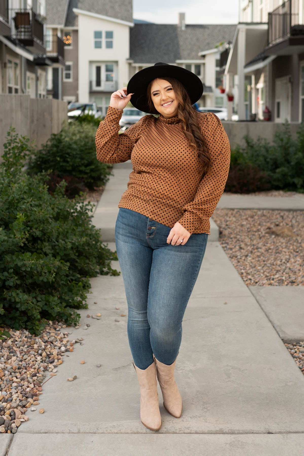Plus size brown turtleneck with polka dots and long sleeves