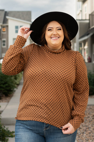 Plus size brown turtleneck with long sleeves and polka dot