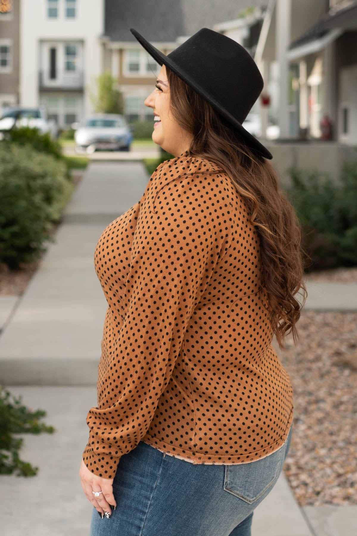 Side view of a plus size brown turtleneck