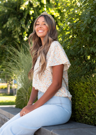 Sage floral top with a ruffle sleeve