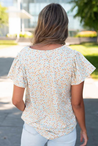 Back view of the sage floral top