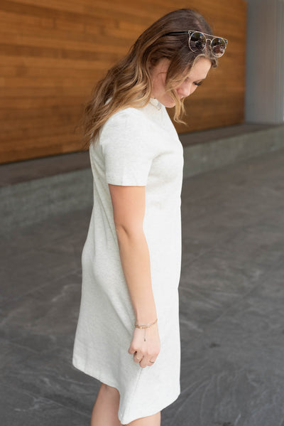 Side view of the heather grey knit dress