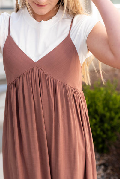 close up of the high waist line on the terracotta maxi dress