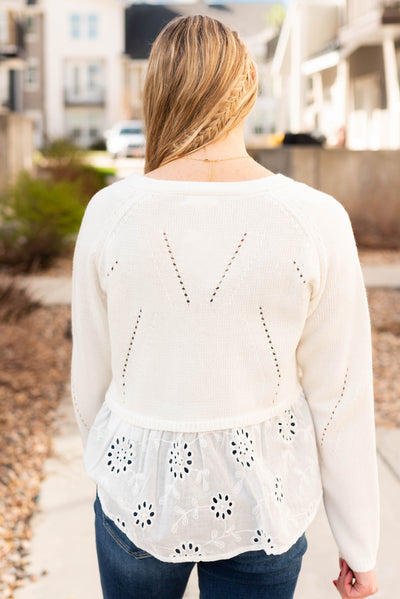 Back view of the off white cardigan