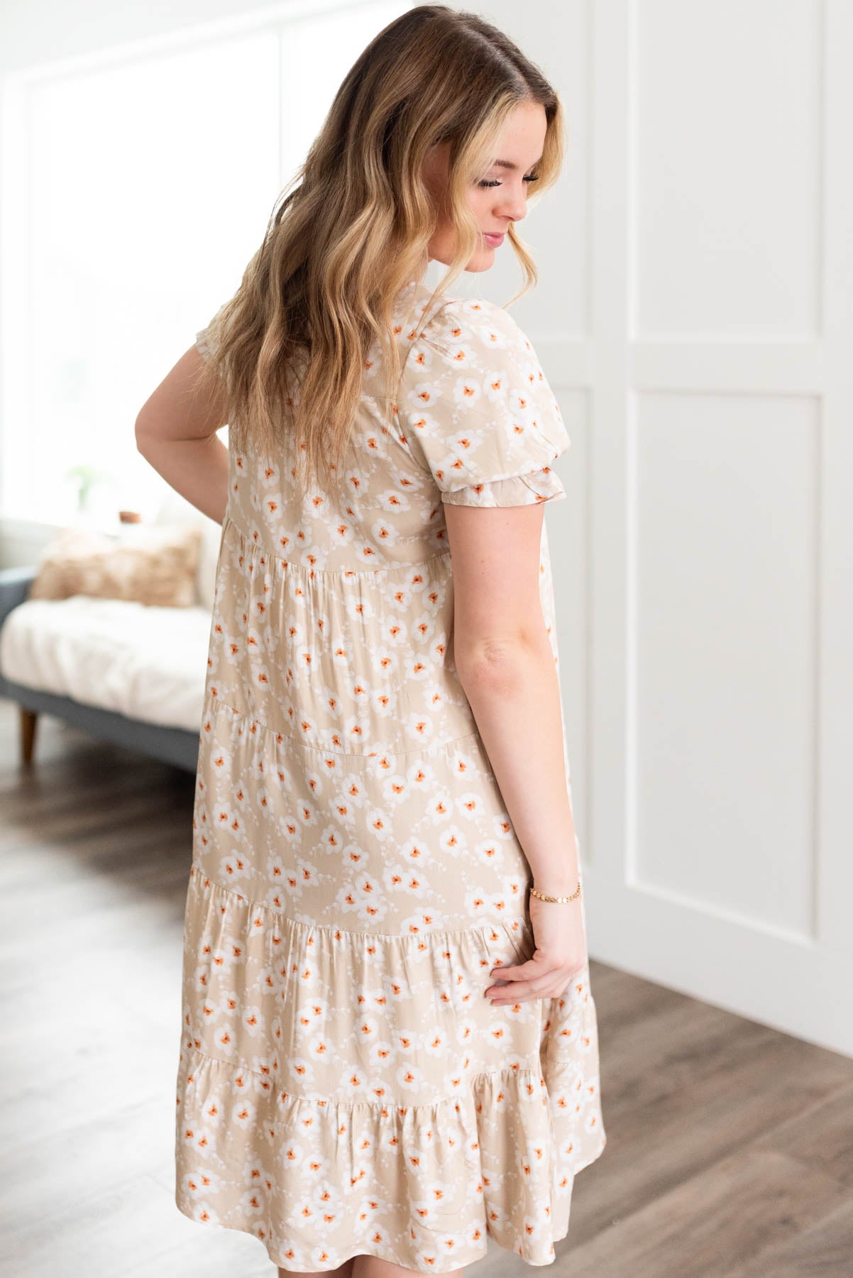 Side view of the beige floral tiered dress