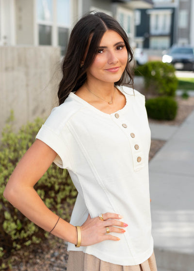 Side view of the ivory henley top