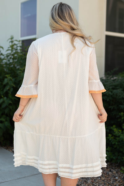 Back view of a plus size white dress