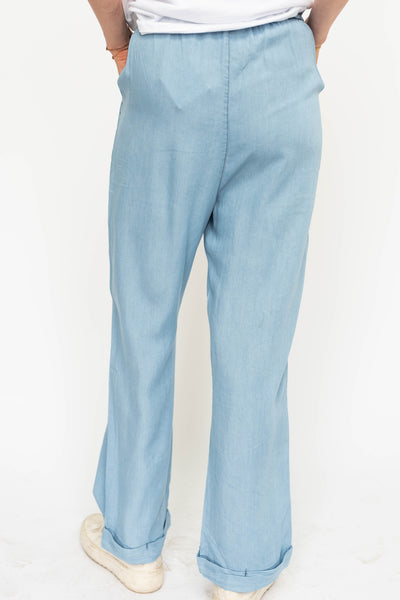 Back view of light denim pants