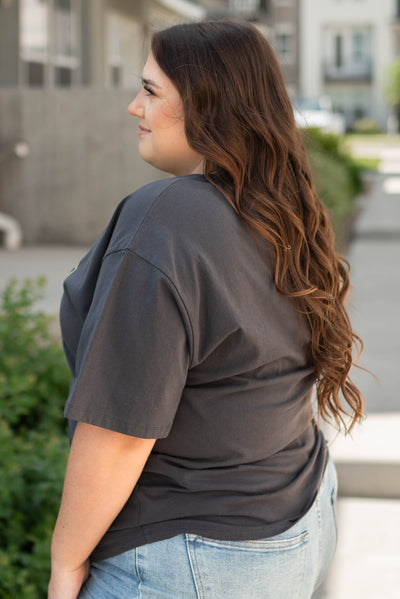 Side view of plus size redwood charcoal tee