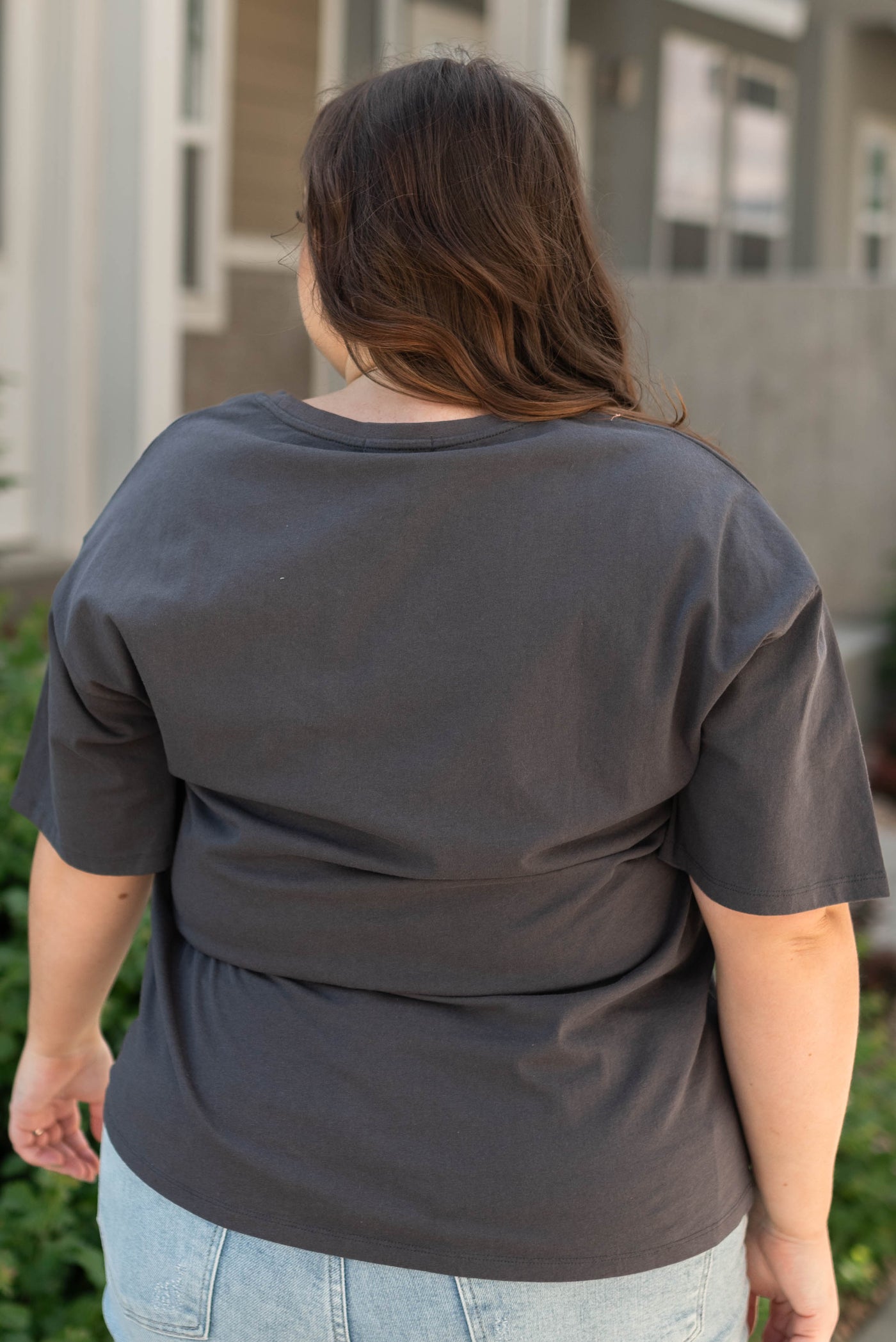 Back view of plus size charcoal tee