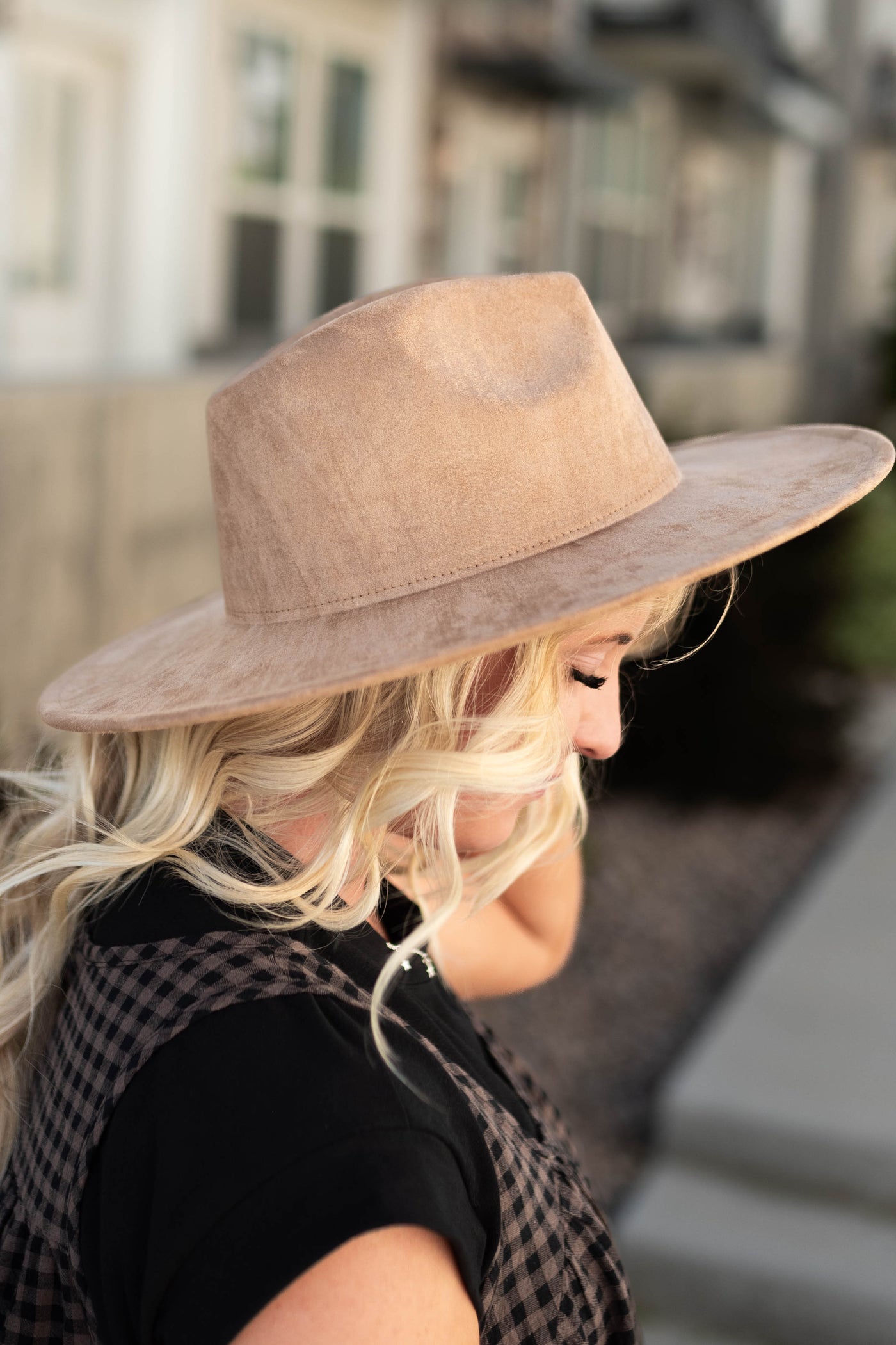 Side view of a camel suede hat