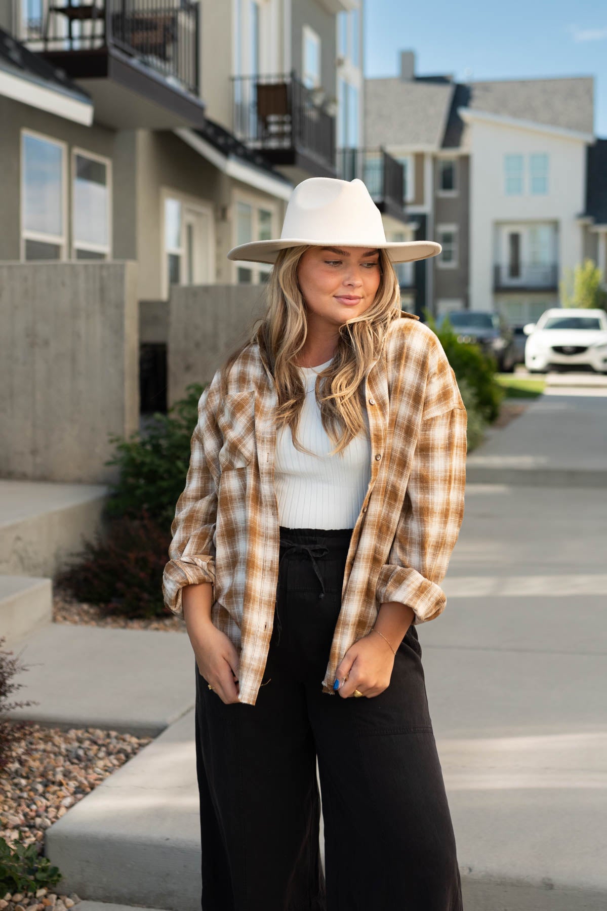 Long sleeve caramel plaid top that buttons up