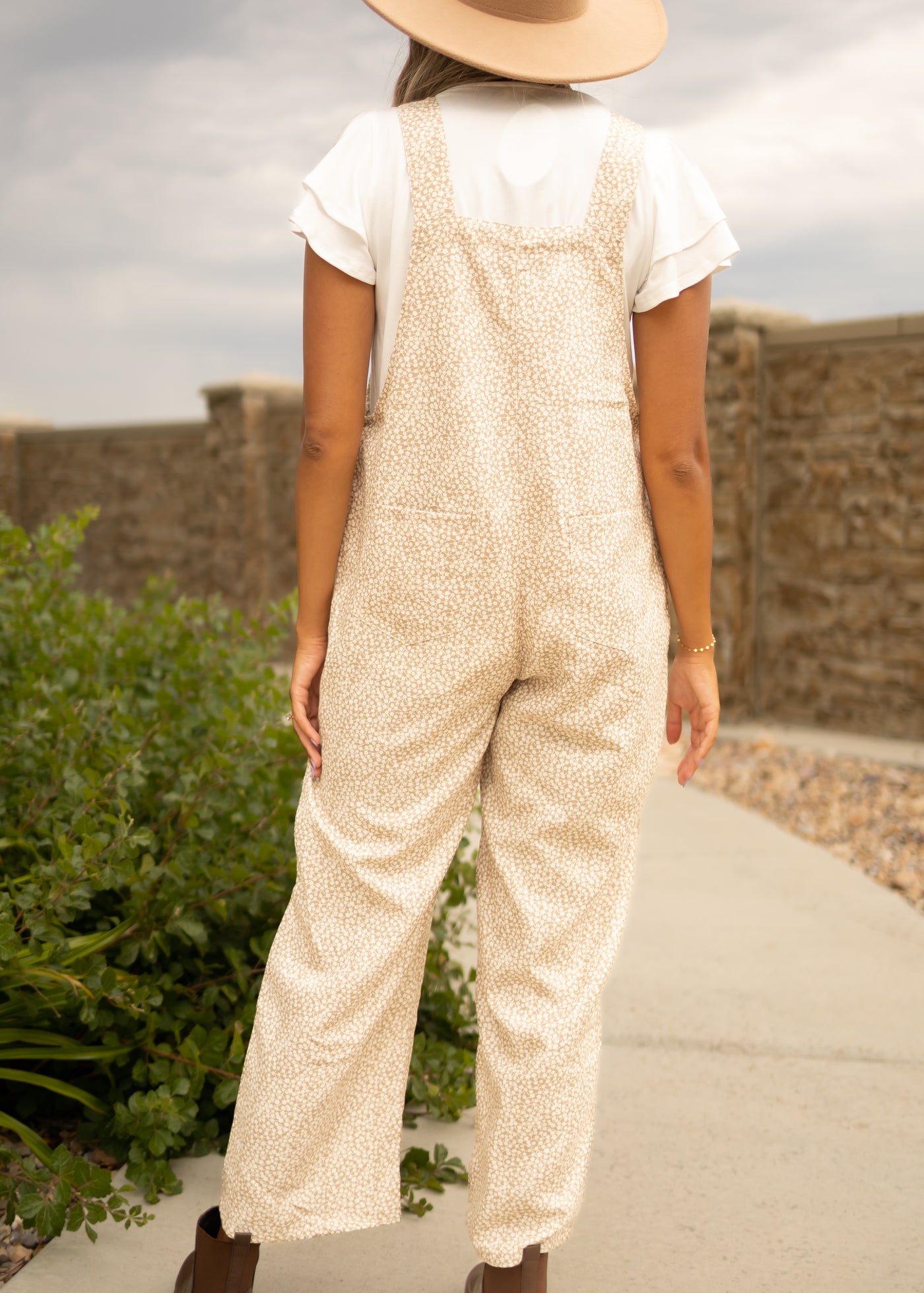 Back view of beige overalls