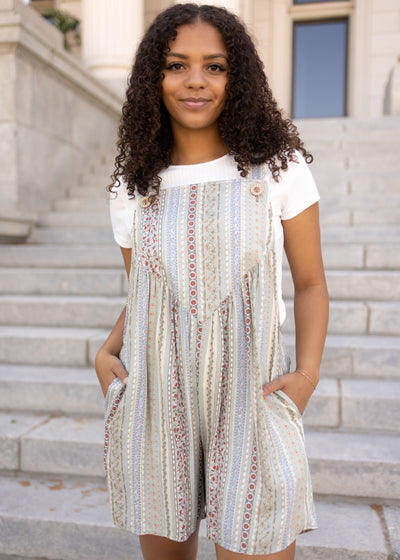 Front view of a pattern sage romper with pockets