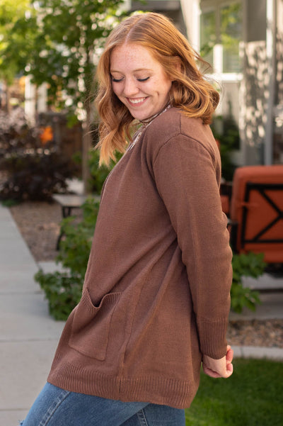 Side view of a chocolate cardigan