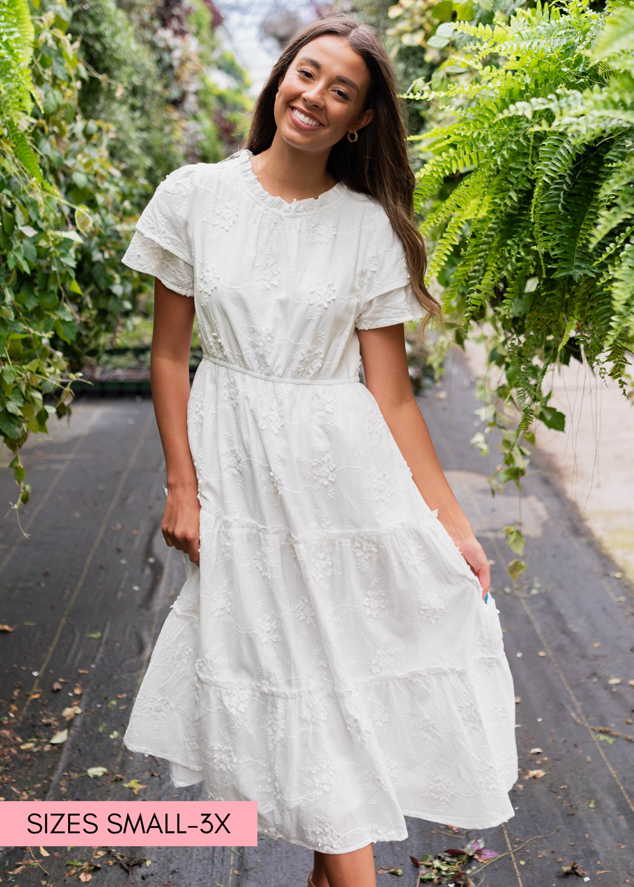 White floral embroidered dress with tiered skirt