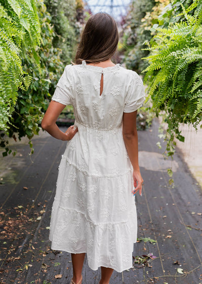 Back view of the white floral embroidered dress