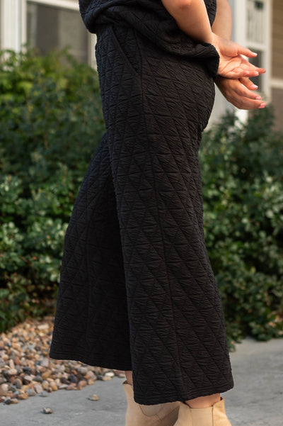 Side view of black pants