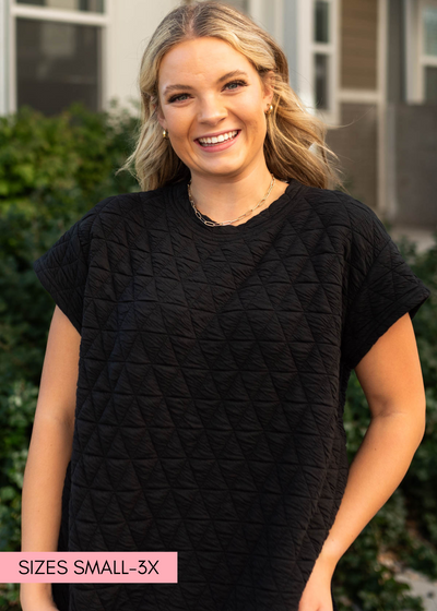 Quilted fabric black top