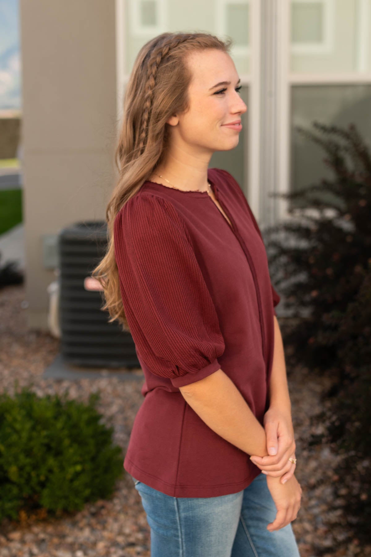 Side view of a burgundy top