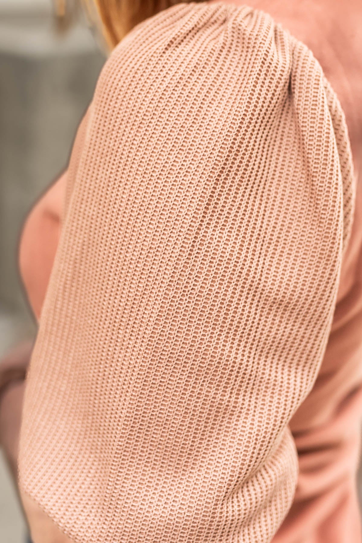Sleeve of a short sleeve cinnamon top