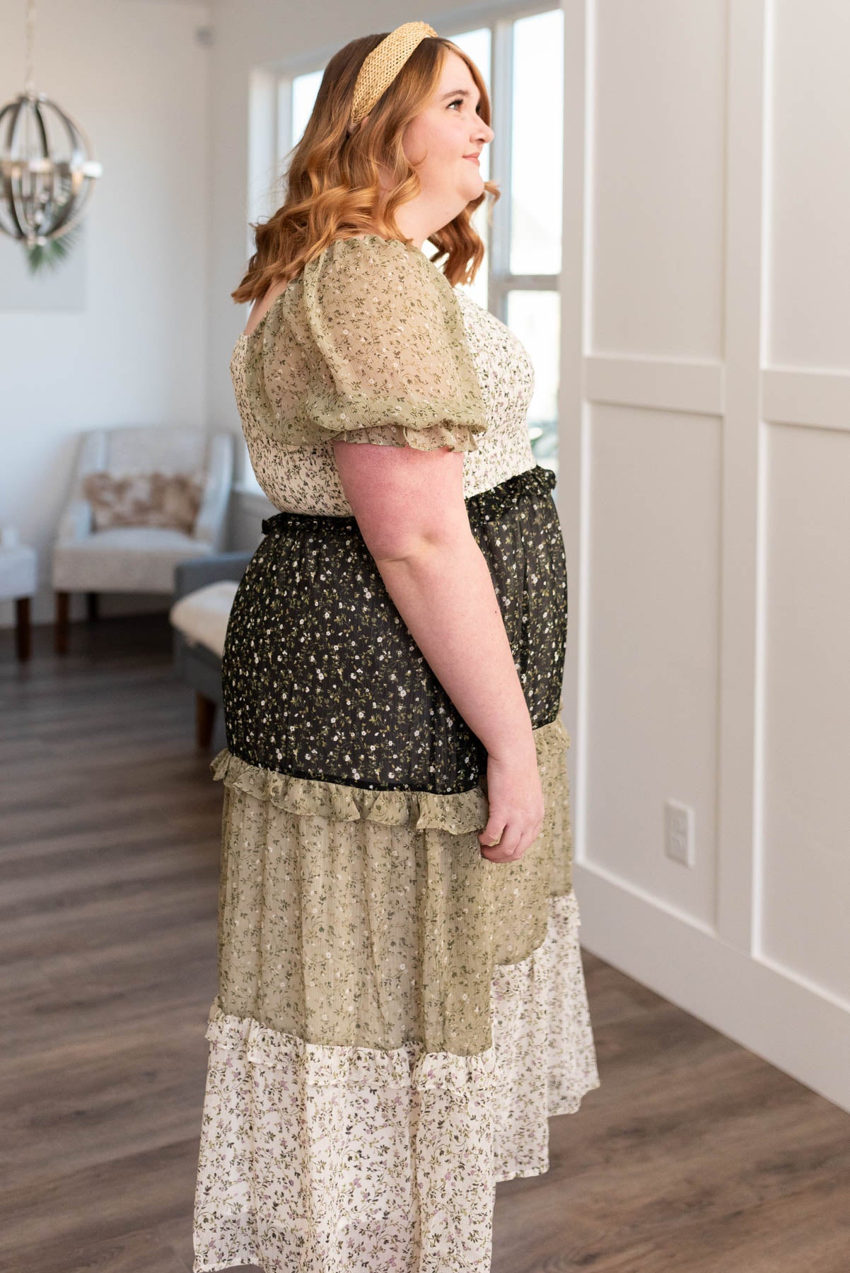 Side view of the short sleeve olive tiered dress