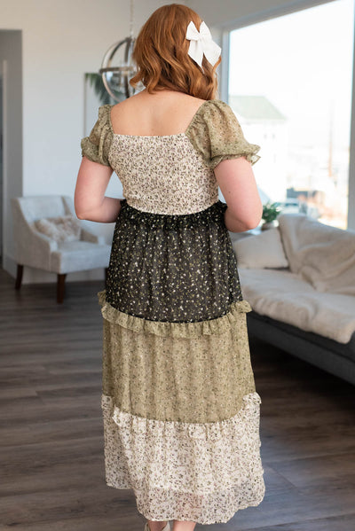 Back view of a short sleeve olive tiered dress