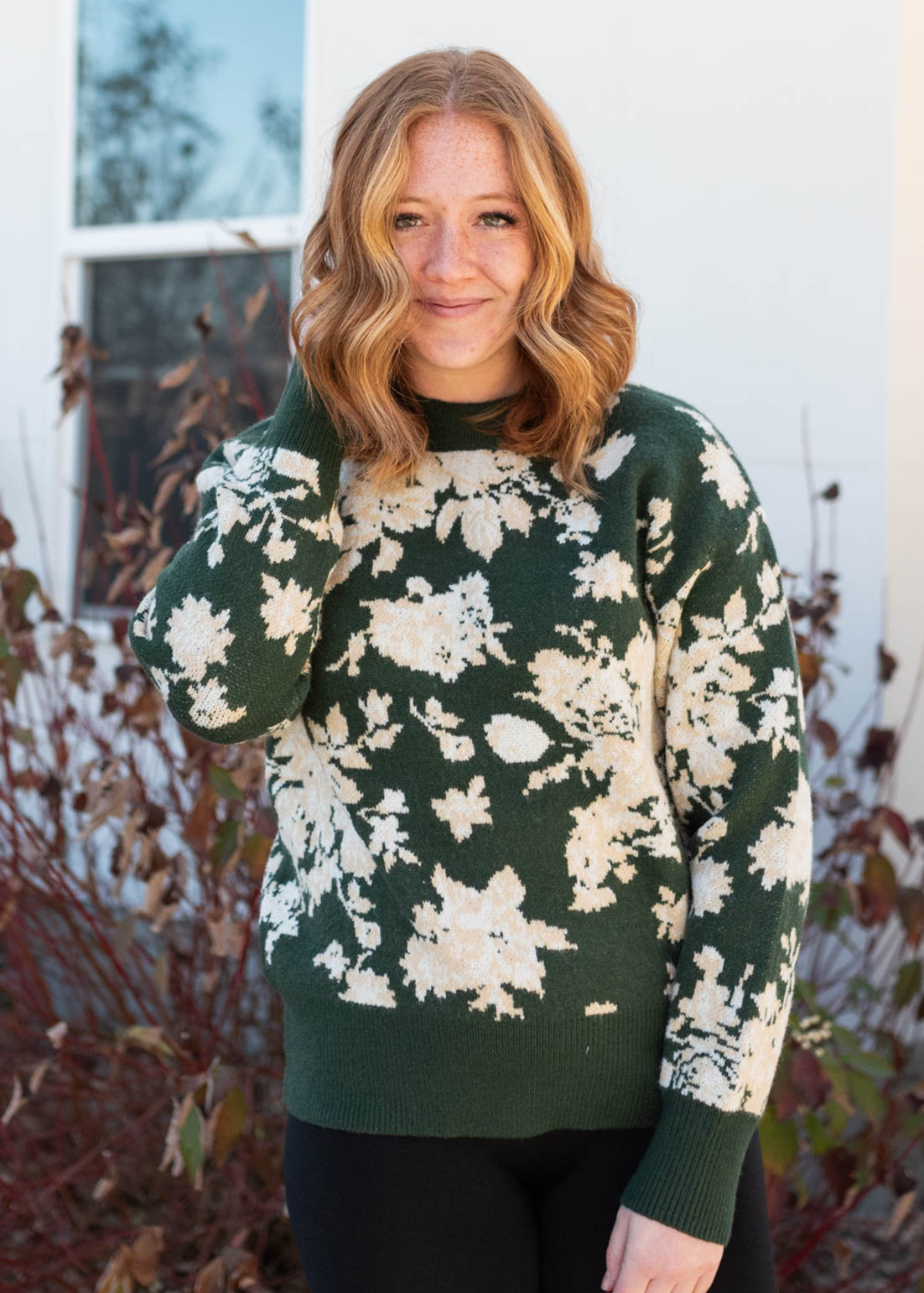 Green floral sweater with cream flowers