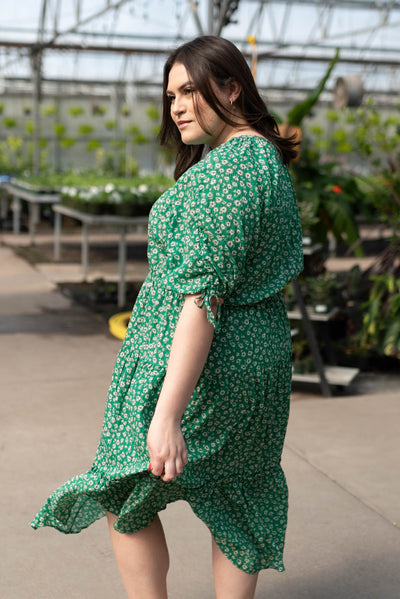 Side view of the plus size green tiered dress
