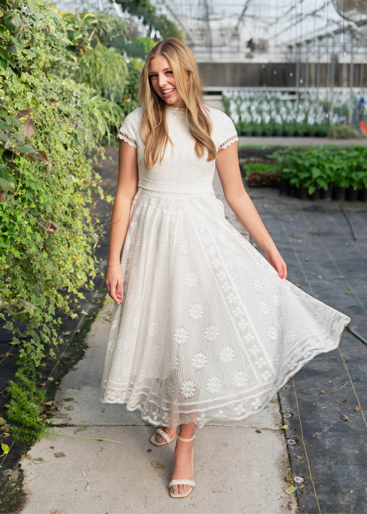 Front view of the ivory lace dress with short sleeves
