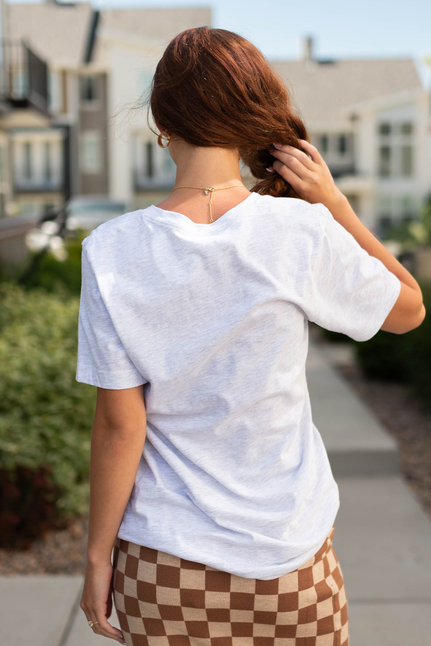 Back view of a small grey tee