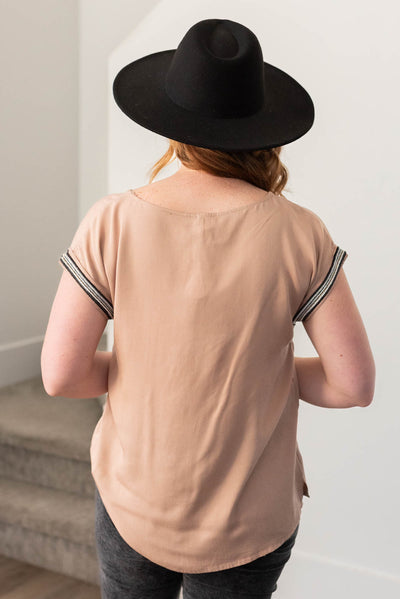 Back view of the taupe top