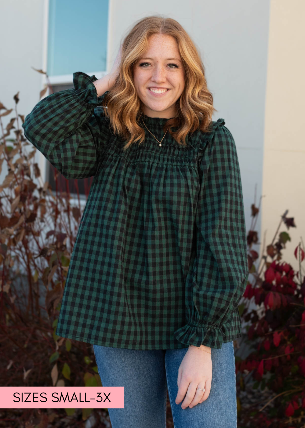 Front view of a gingham hunter green ruffle blouse 