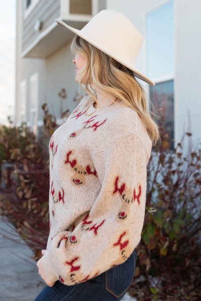 Side view of the Rudolph oatmeal knit sweater