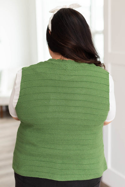 Back view of the plus size green knitted sweater vest