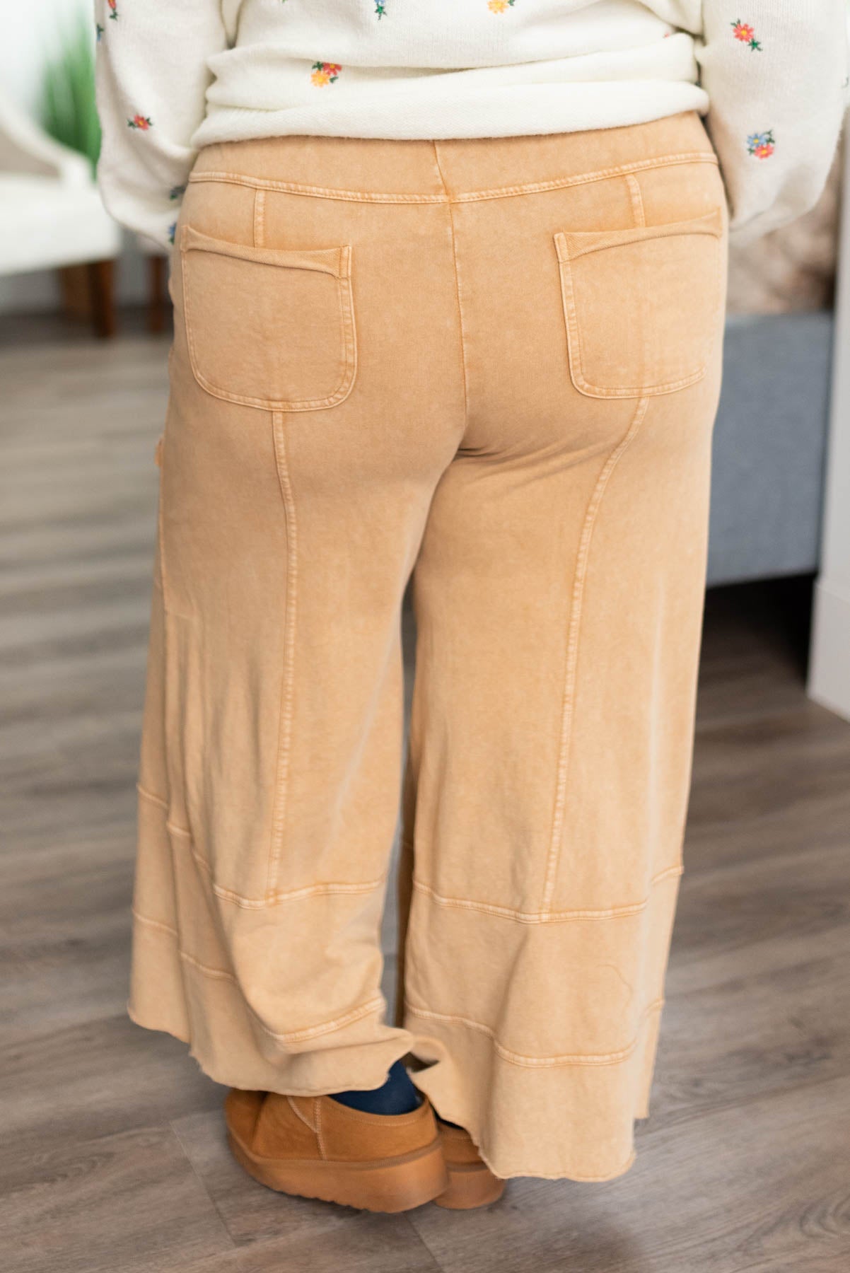 Back view of the plus size camel pants