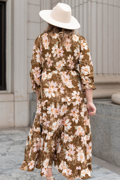 Back view of a brown floral dress
