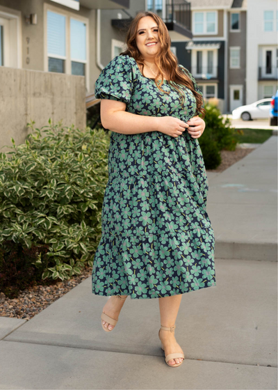 Plus size dark green dress with floral print