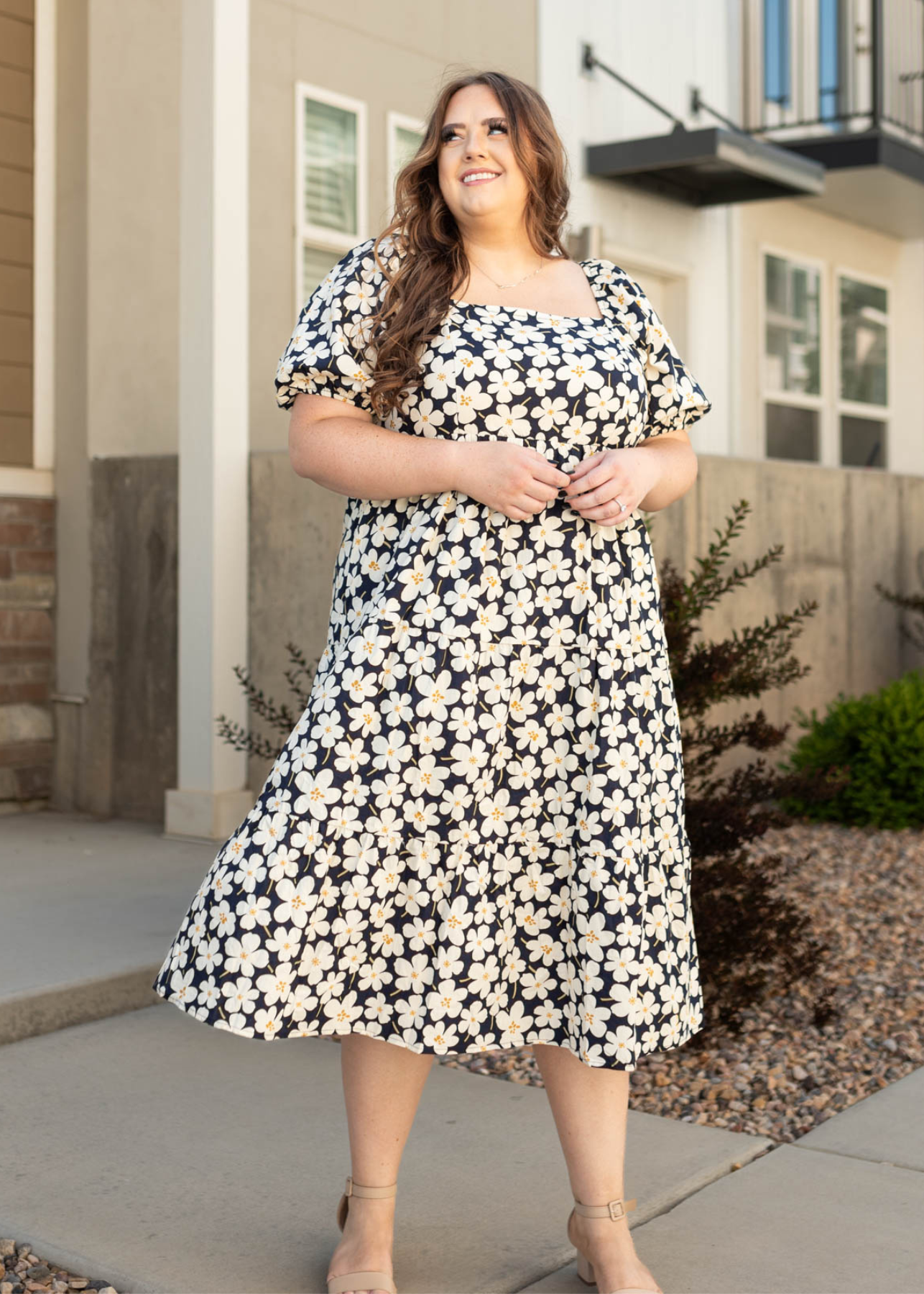 Plus size ivory dress with short sleeves and floral print