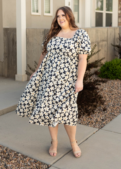 Short sleeve plus size ivory dress with a square neck and floral print