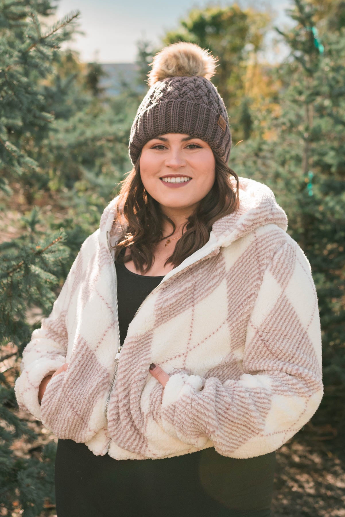 Front view of the plus size pink plaid Sherpa with a hood