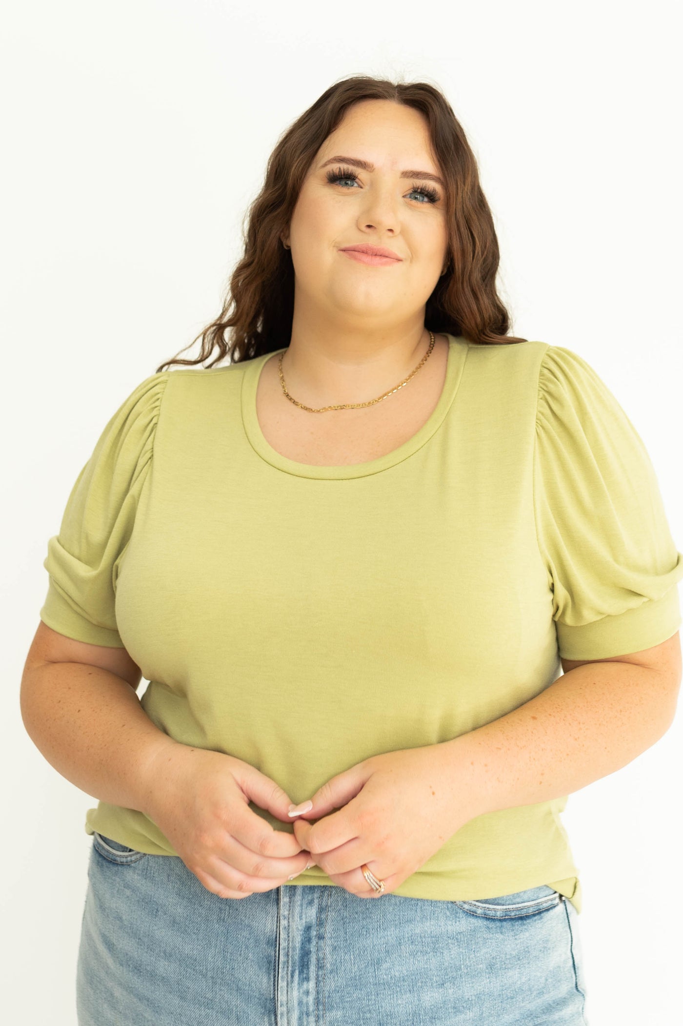 Front plus size kiwi colored knit top.