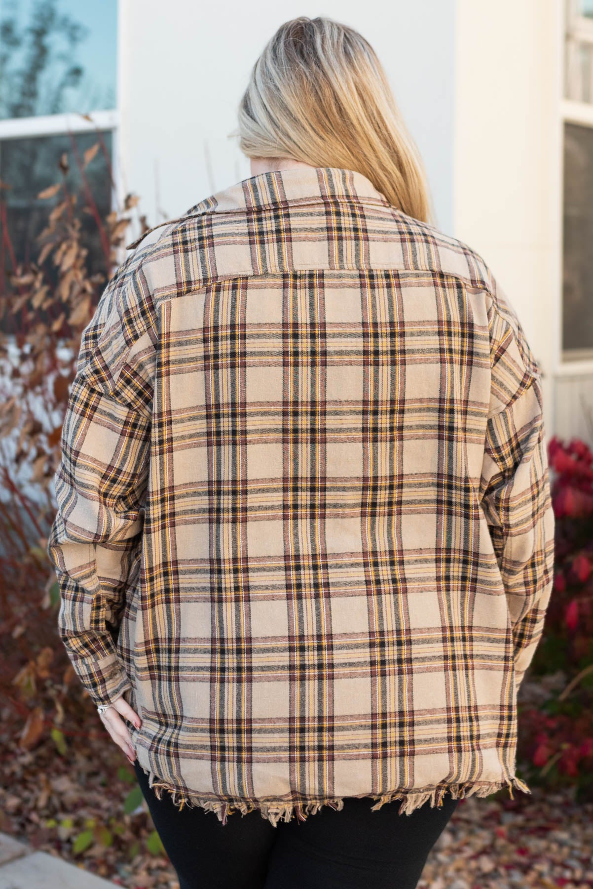 Back view of the plus size plaid button down top